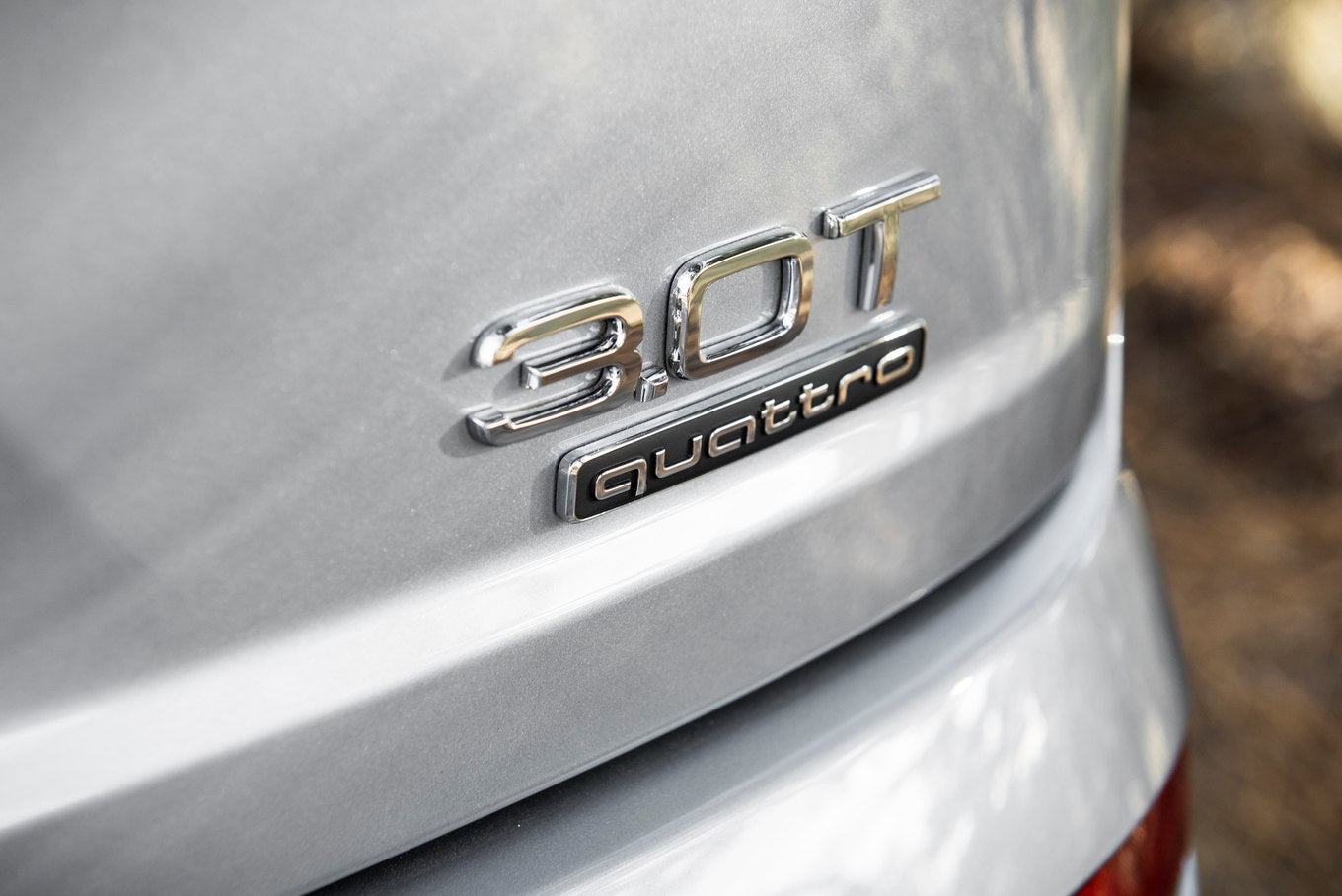 Емблема QUATTRO лепяща черна